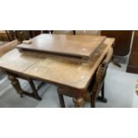 19th cent. Oak extending dining table with two leaves, on turned supports. Width 42ins. Length