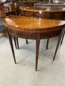 19th cent. Mahogany demi lune fold over tea table. Boxwood stringing on delicate tapering