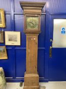 Clocks: A good mid 18th cent. Oak longcase brass face, double chapter ring, Roman/Arabic numerals.