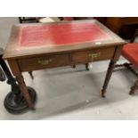 Edward mahogany desk with two drawers beneath red leather skiver, on turned supports. 36ins. x