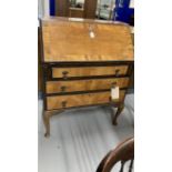 20th cent. Mahogany drop front inlaid bureau on cabriole supports.