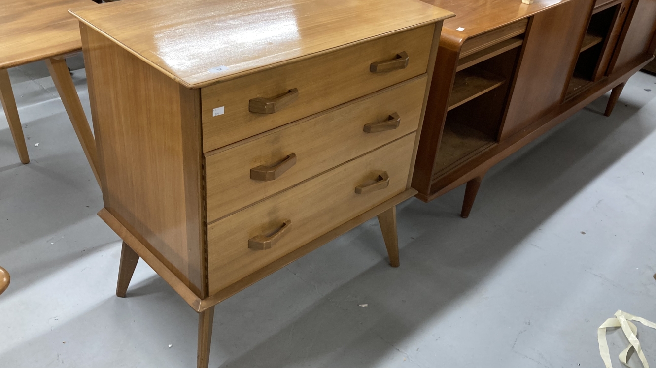 Post-war design Scandinavian style teak chest of three graduated drawers.