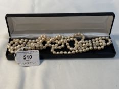 Jewellery: Opera length row of cultured pearls. One hundred and fifty uniform cultured pearls.