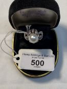 Jewellery: White metal ring cluster centre set with a 10mm cultured pearl surrounded by forty two