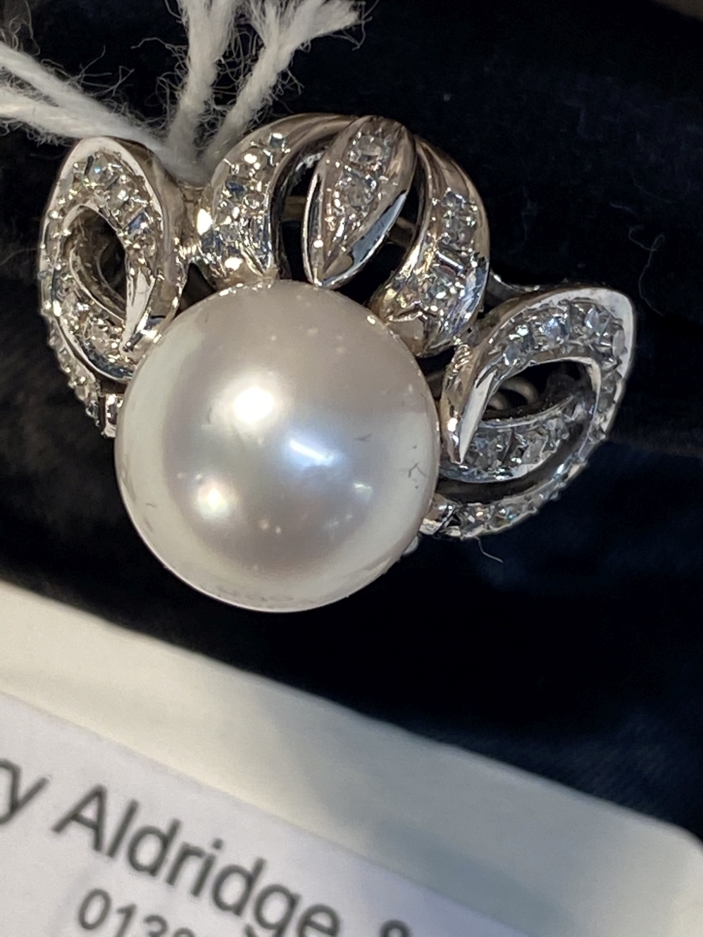 Jewellery: White metal ring cluster centre set with a 10mm cultured pearl surrounded by forty two - Image 2 of 3