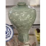 20th cent. Oriental pale green baluster shaped vase, slender neck rim decorated with cranes and