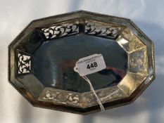 White metal decagon shaped dish with pierced side and bead rim, stamped 925 with coronet above. 7ins