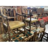 Good quality Gothic style peg jointed dining chairs with green leather upholstered seats. Six plus