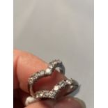 Jewellery: Two individual diamond seven stone wishbone rings. Each ring set with seven round