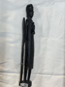 Tribal Art: Treen carved figure of a Masai Warrior with spear and gourd.