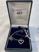 Jewellery: White metal heart pendant tests 14ct, set with small diamonds. Fine link chain tests as