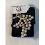 Jewellery: Yellow metal spray brooch set with thirty cultured pearls, size of pearls 6.5mm to 6.5