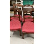 19th cent. Mahogany Gothic dining chairs with sabre leg rear supports. Set of four.