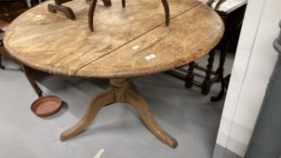 19th cent. Pine tilt top table on pedestal support with tripod feet.