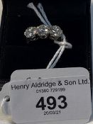 Jewellery: Diamond three stone ring. Three round modern brilliant cut diamonds, claw set. Gross