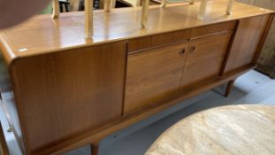 1960 Danish designer furniture. Clausen & Son teak long sideboard, four cupboard doors to reveal