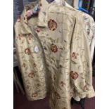 Fashion: Silk embroidered shirts/jackets, one cream embroidered with pink flowers, button down