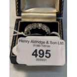Jewellery: White metal full eternity ring, claw set fourteen brilliant cut diamonds, estimated total