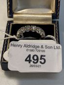 Jewellery: White metal full eternity ring, claw set fourteen brilliant cut diamonds, estimated total