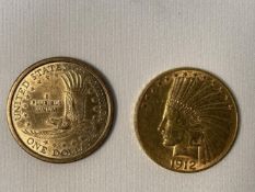 Coins: 1912 US gold ten dollar coin (16.71g.) in good order. Plus a Sacagawea dollar.