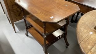 Early 20th cent. Mahogany triple shelved serving trolley. Galleried bottom shelf on brass castors.