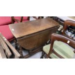 19th cent. Oak gate leg dining table on turned supports, drawer beneath. 45ins. x 35ins. x 29½ins.