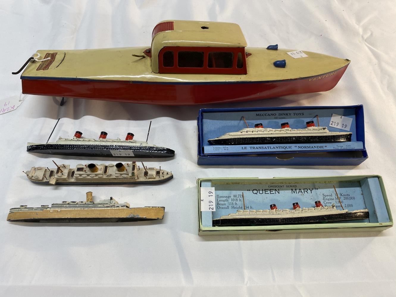 Toys: Clockwork speedboat 'Festive' produced by Hornby c1940s, with key and rudder. Plus boxed Dinky