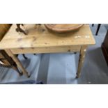 19th/early 20th cent. Pine kitchen table on turned supports on castors. 38ins. x 25ins. x 29½ins.