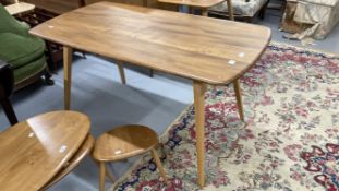 1960s Ercol style teak and beech dining table on tapering supports. 54ins. x 27ins. x 28ins.