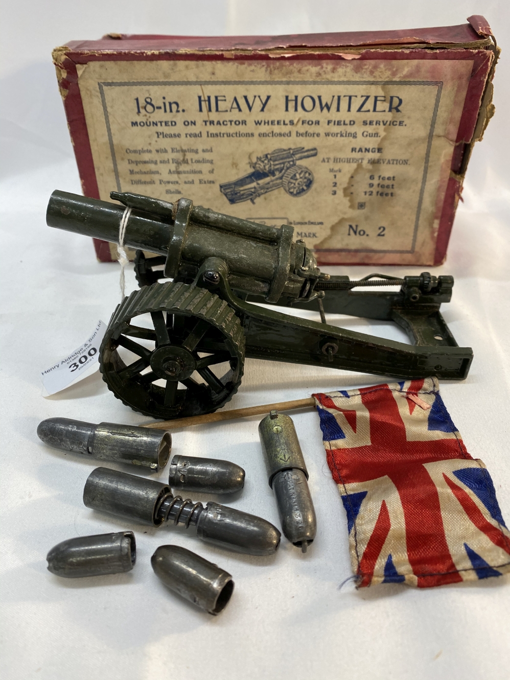 Military Toys: W. Britain, 18ins. Heavy Howitzer, No. 2, military green, mounted on tractor