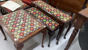 Mid 20th cent. Oak nest of two tables with upholstered geometric seats, tapering supports on pad