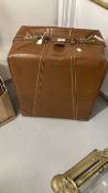 Vintage Luggage: Oblong leather suitcase with shot silk lining. 23ins. x 19ins. x 12ins.