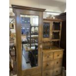 Arts & Crafts: Oak compactum comprising single mirrored door, two short and three long drawers,