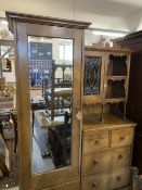 Arts & Crafts: Oak compactum comprising single mirrored door, two short and three long drawers,