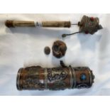 20th cent. Tibetan prayer wheel copper head 12ins. Copper and white metal scroll holder 8ins. Copper