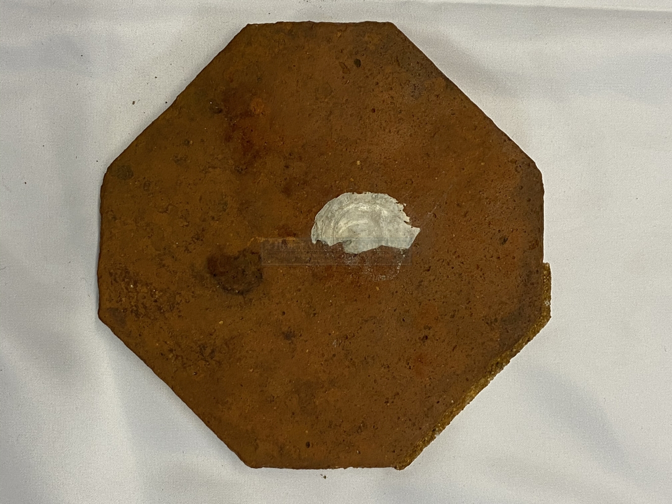 R.M.S. Carpathia, Salvaged Red Octagonal Floor Tile Patterned earthenware floor tile from an unknown