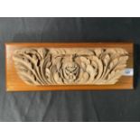 R.M.S. BRITANNIC: Carved oak section of architrave mounted on a modern backing board. 12¾ins.