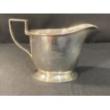 WHITE STAR LINE: Mappin & Webb milk jug. 'White Star Line' on base. Burgee on one side.