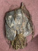 Tribal Art: 20th cent. Sub Saharan African leather bag decorated with shells, possibly Toureg with