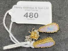 Jewellery: Opal and diamond drop ear studs. A pair of drops comprising a pear shaped white opal,