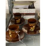 20th cent. Ceramics: Royal Doulton Kingsware, Pied Piper pattern, Demitasse cups and saucers, coffee