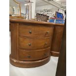 Modern leather topped oval chest of drawers, a pair. 33ins.