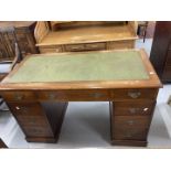 Edwardian oak double pedestal desk with green leather skiver. 48ins. x 30ins. x 24ins.