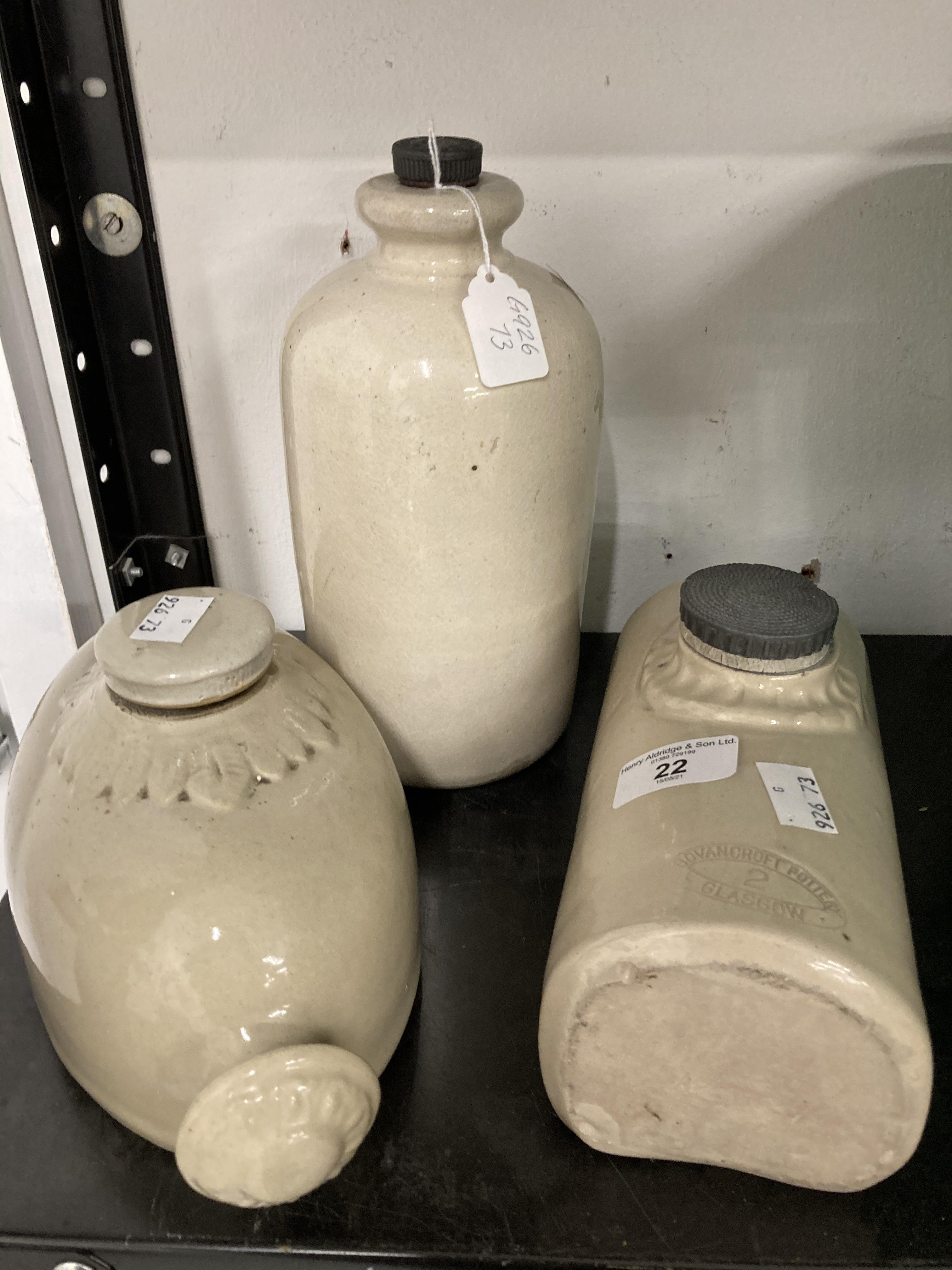 Stoneware: Two hot water bottles, one marked Bourne Denby, the second Govancraft Pottery Glasgow,