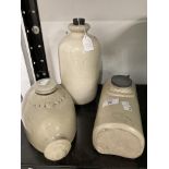 Stoneware: Two hot water bottles, one marked Bourne Denby, the second Govancraft Pottery Glasgow,
