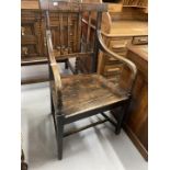 Late 18th cent. English oak elbow chair.