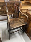 Late 18th cent. English oak elbow chair.