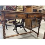 20th cent. Oak dwarf two drawer buffet on barley twist support. 42ins. x 17ins. x 30ins.