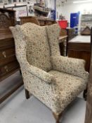 19th cent. Wing back upholstered armchair of good proportions.