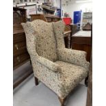 19th cent. Wing back upholstered armchair of good proportions.